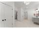 Elegant bathroom with tiled floor, modern lighting, and storage at 3805 Carder Ln, Cumming, GA 30028