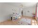 Bright bedroom with wood floor, ceiling fan, and loft bed with storage at 3805 Carder Ln, Cumming, GA 30028
