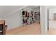 Spacious walk-in closet with clothing racks and shoe shelves at 3805 Carder Ln, Cumming, GA 30028
