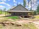 Charming home with a covered porch, perfect for enjoying the outdoors at 3805 Carder Ln, Cumming, GA 30028
