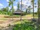 Beautiful home with a covered porch and a well-manicured lawn at 3805 Carder Ln, Cumming, GA 30028