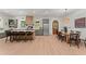 Spacious eat-in kitchen with a large island, bar seating, stainless steel appliances, and wood accents at 3805 Carder Ln, Cumming, GA 30028