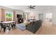 Inviting living room with open floor plan, large windows and wood flooring at 3805 Carder Ln, Cumming, GA 30028