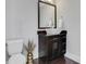 Elegant powder room features a modern vessel sink, stylish vanity, and sleek fixtures at 4550 Lois Se St, Smyrna, GA 30080