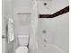 Bathroom featuring a white tiled shower with modern fixtures at 4550 Lois Se St, Smyrna, GA 30080