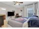 Bedroom featuring a sports-themed decor and plush bedding at 4550 Lois Se St, Smyrna, GA 30080