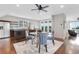 Bright dining area features a glass-topped table, a wet bar and balcony doors for a great view at 4550 Lois Se St, Smyrna, GA 30080