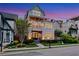 Stunning three-story home showcasing a welcoming entrance, charming balcony, and a rooftop terrace with beautiful views at 4550 Lois Se St, Smyrna, GA 30080