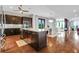 Open floor plan kitchen features stainless steel appliances and connects to living area at 4550 Lois Se St, Smyrna, GA 30080