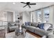 Comfortable living room featuring a plush gray sofa and elegant decor with backyard access at 4550 Lois Se St, Smyrna, GA 30080