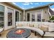 Relaxing outdoor patio with comfortable seating and a fire pit perfect for entertaining or quiet evenings at 4550 Lois Se St, Smyrna, GA 30080