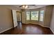 Bedroom with hardwood floors, natural light, and bay windows at 6231 Waterton Way, Lithonia, GA 30058