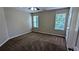 Bedroom featuring natural light, carpet flooring, and a ceiling fan at 6231 Waterton Way, Lithonia, GA 30058