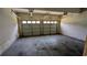 Spacious two-car garage with dual doors and ample storage potential at 6231 Waterton Way, Lithonia, GA 30058