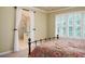 Relaxing bedroom featuring an attached bathroom and lots of natural light at 725 Heathland Dr, Roswell, GA 30075