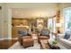 Open-concept living area seamlessly blends the living room and dining space at 725 Heathland Dr, Roswell, GA 30075