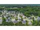 Lush green trees surround a desirable neighborhood near winding roads and cul-de-sacs at 2023 Arbor Springs Way, Buford, GA 30519