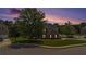 Beautiful two story home with stone facade and a large manicured front yard at 2023 Arbor Springs Way, Buford, GA 30519