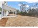 A spacious backyard featuring a covered patio and newly laid sod at 2719 Byess Ct, Marietta, GA 30064