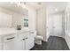 Modern bathroom with a white vanity, black hardware and hexagon tile floors at 2719 Byess Ct, Marietta, GA 30064