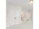 Bright bedroom featuring neutral carpet, and access to ensuite bathroom and closets at 2719 Byess Ct, Marietta, GA 30064