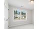 Bright bedroom with plush carpet, a window providing a view of the neighborhood at 2719 Byess Ct, Marietta, GA 30064