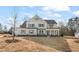 Stunning two-story home with grey siding, shutters and a well-manicured lawn at 2719 Byess Ct, Marietta, GA 30064