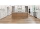 Bright kitchen with a central island, white cabinets, and modern appliances at 2719 Byess Ct, Marietta, GA 30064