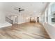 Open-concept living space with hardwood floors and a view of the kitchen at 2719 Byess Ct, Marietta, GA 30064