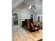 Spacious living room featuring tile flooring, fireplace, and plenty of natural light at 5618 Highway 212, Covington, GA 30016