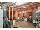 Unfinished basement with exposed wood beams at 1645 Horseshoe Creek Ln, Cumming, GA 30041