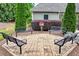 Charming outdoor seating area featuring benches and a community book exchange at 1645 Horseshoe Creek Ln, Cumming, GA 30041