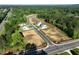 New home sites are shown in a wooded area, offering serene surroundings and ample space at 2722 Byess Ct, Marietta, GA 30064