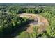 New community pond view surrounded by trees at 2722 Byess Ct, Marietta, GA 30064