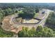 Community with pond surrounded by green trees at 2722 Byess Ct, Marietta, GA 30064