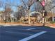 Picturesque neighborhood with a view of a park, benches, trees, and sidewalks on a sunny day at 2722 Byess Ct, Marietta, GA 30064