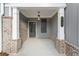 Charming front porch featuring brick accents and a well-lit entrance at 2722 Byess Ct, Marietta, GA 30064