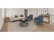 Bright living room featuring a comfortable sofa, two armchairs, and a stylish coffee table at 2722 Byess Ct, Marietta, GA 30064