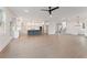 Spacious open-concept living area featuring hardwood floors, modern lighting, and an eat-in kitchen at 2722 Byess Ct, Marietta, GA 30064