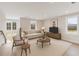 Cozy living room filled with natural light, neutral furniture, and an area rug adding warmth to the room at 2722 Byess Ct, Marietta, GA 30064