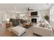 Bright living room features a fireplace, neutral walls, and a seamless flow into the dining area at 2722 Byess Ct, Marietta, GA 30064