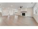 Spacious living room with fireplace, hardwood floors, recessed lighting, and large windows for plenty of sunlight at 2722 Byess Ct, Marietta, GA 30064