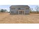 Rear exterior showcasing a spacious backyard and covered patio at 2722 Byess Ct, Marietta, GA 30064