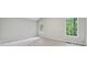 Spacious bedroom with neutral carpet, two windows, and natural lighting at 2986 Edenberry Nw Ln, Kennesaw, GA 30152