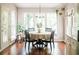 Bright breakfast nook featuring hardwood floors and large windows allowing natural light to flood the space at 2986 Edenberry Nw Ln, Kennesaw, GA 30152