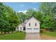 Inviting two-story home with a well-kept lawn, mature trees, and a two-car garage, perfect for Gathering living at 2986 Edenberry Nw Ln, Kennesaw, GA 30152
