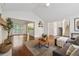 Spacious living room boasts hardwood floors, an open layout, and abundant natural light at 2986 Edenberry Nw Ln, Kennesaw, GA 30152