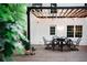 Charming outdoor patio with dining table set on wood deck and pergola at 2986 Edenberry Nw Ln, Kennesaw, GA 30152