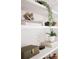 Stylish shelf decor, enhancing the aesthetic appeal of the home at 2986 Edenberry Nw Ln, Kennesaw, GA 30152