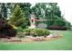 Landscaped entrance to the Arranmore community with stone signage and manicured shrubbery at 2986 Edenberry Nw Ln, Kennesaw, GA 30152
